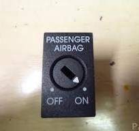 Comutator airbag pasager